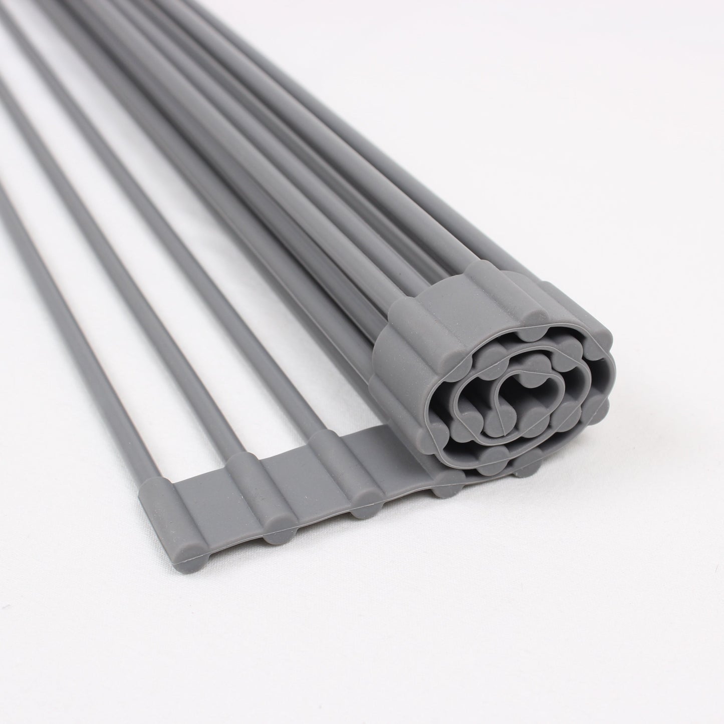 White Magic Drying Rack & Trivet Rolled Up