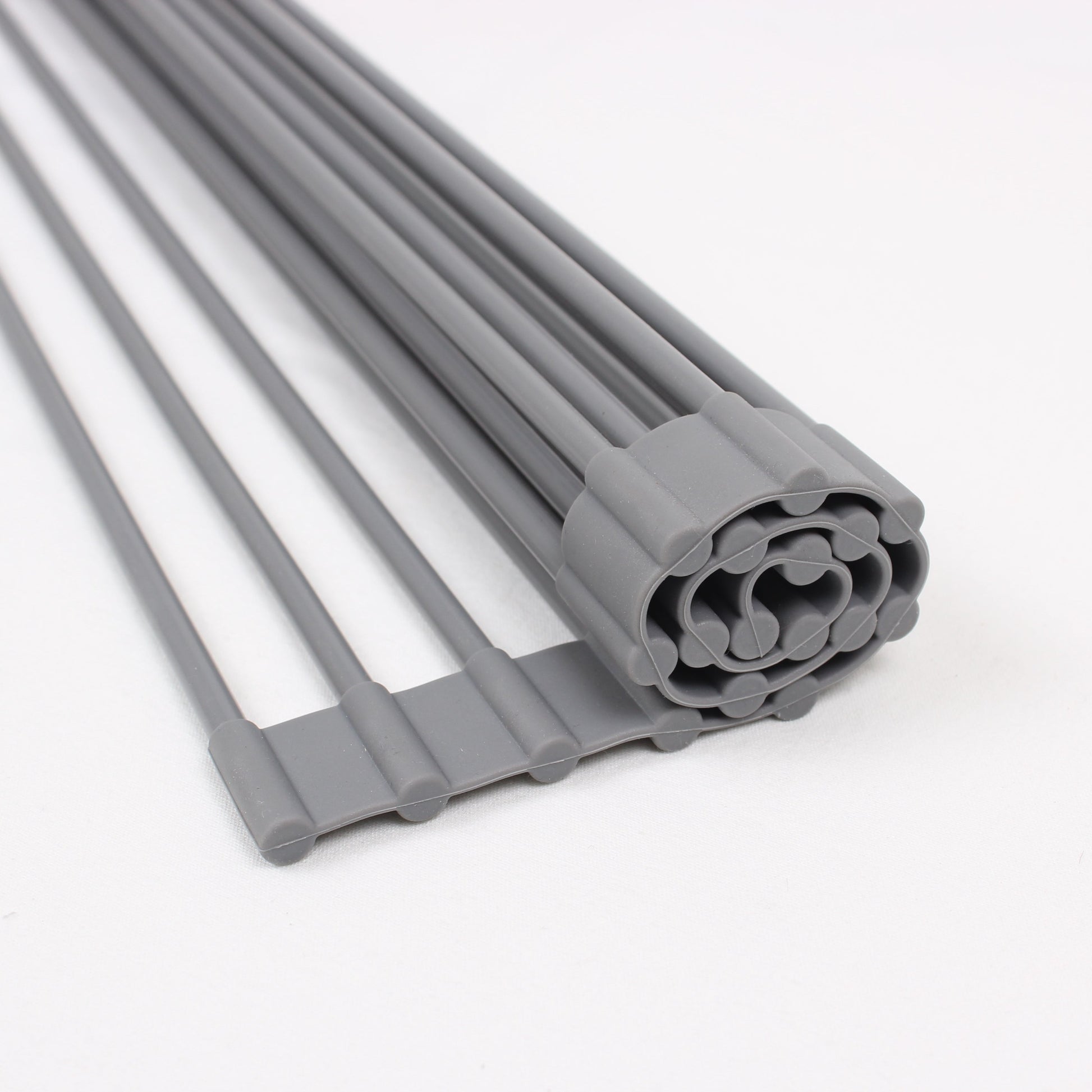 White Magic Drying Rack & Trivet Rolled Up