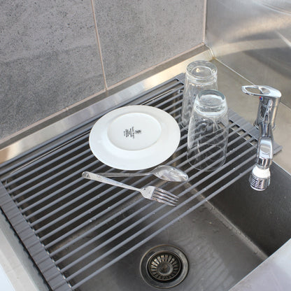 Dishes Stacked on the Drying Rack & Trivet from White Magic