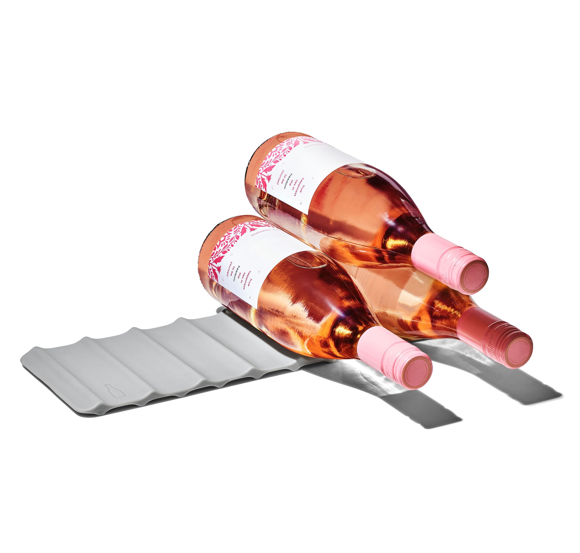 Bottles stacked on the Oxo Beverage Mat