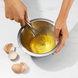 Beating eggs in the Oxo Good Grips 3pce Insulated Mixing Bowl Set
